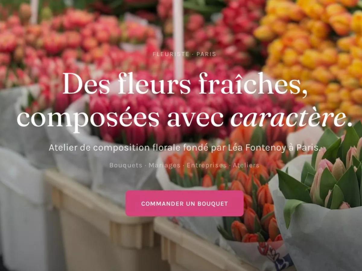 En-tête du site Atelier Pistil : « Des fleurs fraîches, composées avec caractère », sur une photo d'étal de tulipes, avec le bouton Commander un bouquet